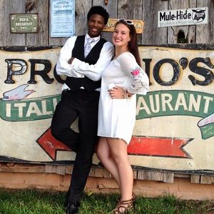 White dress with roses on sleeves